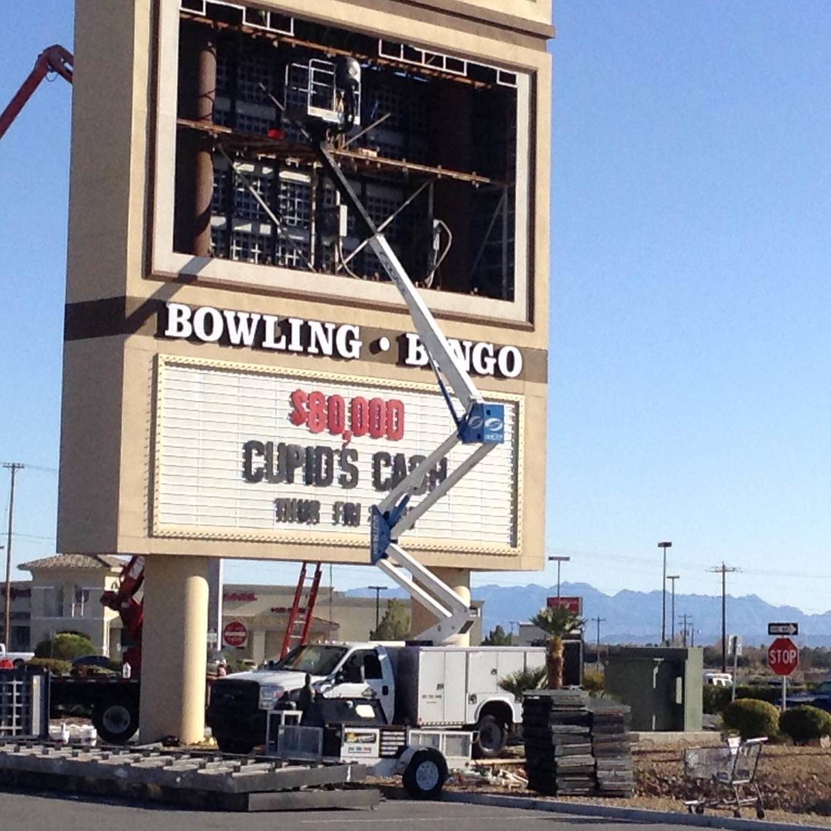 Workers put finishing touches to upgrades to the Pahrump Nugget Hotel and Casino sign off of Hi ...