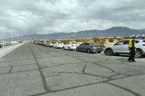 Selwyn Harris/Pahrump Valley Times Dozens of drivers and passengers lined up along Floyd Street ...