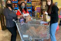 Special to the Pahrump Valley Times RMHC volunteers handed out wish lists at area Smith’s st ...