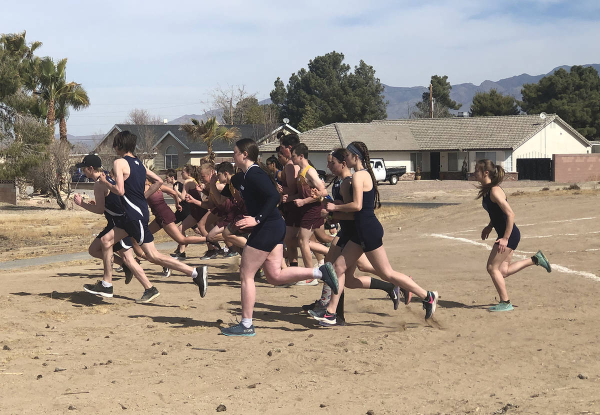 Tom Rysinski/Pahrump Valley Times Runners in the second race break from the starting line durin ...