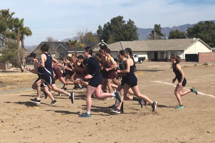 Tom Rysinski/Pahrump Valley Times Runners in the second race break from the starting line durin ...