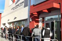 Bizuayehu Tesfaye/Las Vegas Review-Journal People wait in line at One-Stop Career Center in thi ...
