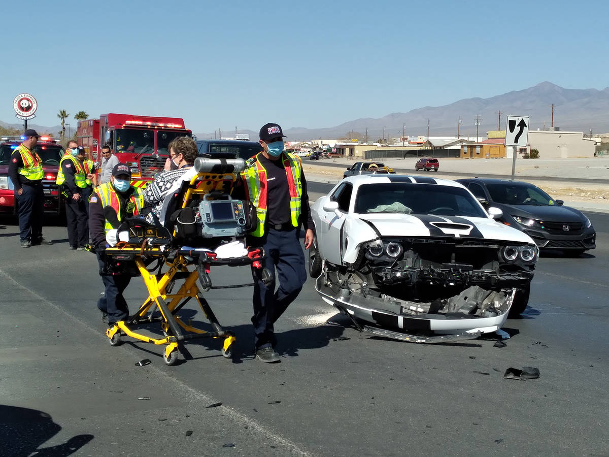 Selwyn Harris/Pahrump Valley Times The driver of a late model Dodge Challenger was transported ...
