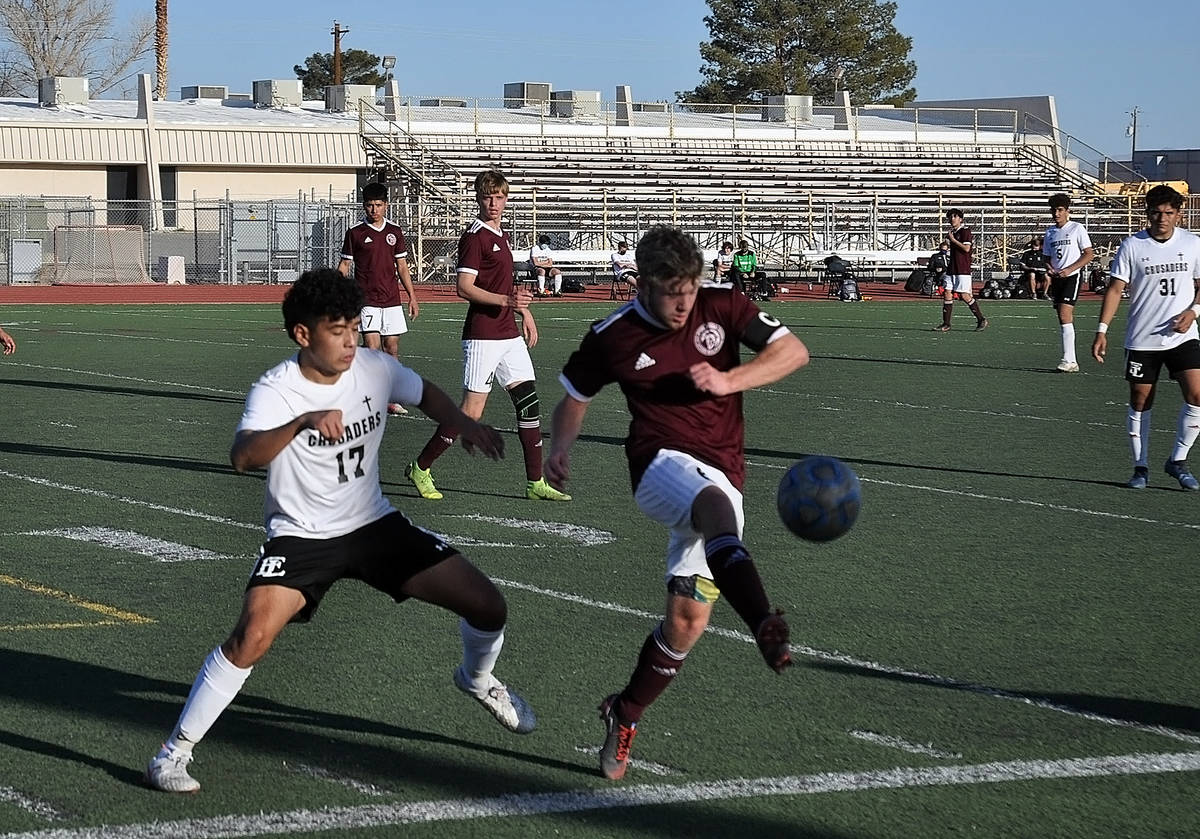 Horace Langford Jr./Pahrump Valley Times Junior Christian Mott works to control the ball while ...