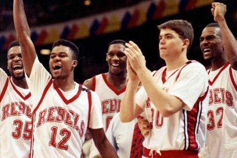 UNLV Rebels players Mosses Scurry, Anderson Hunt, David Butler, David Rice, Stacey Augmon surro ...