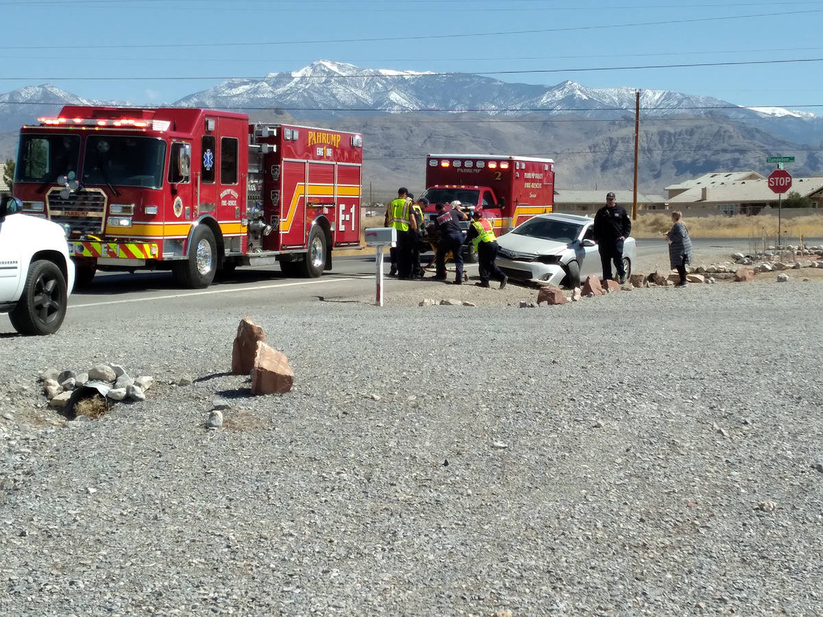 Selwyn Harris/Pahrump Valley Times Pahrump Valley Fire and Rescue Services EMTs prepare to tran ...