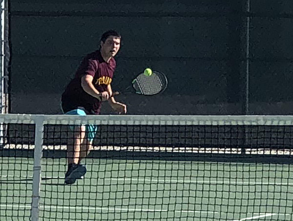 Tom Rysinski/Pahrump Valley Times Pahrump Valley's Anthony Luca lines up a backhand during the ...