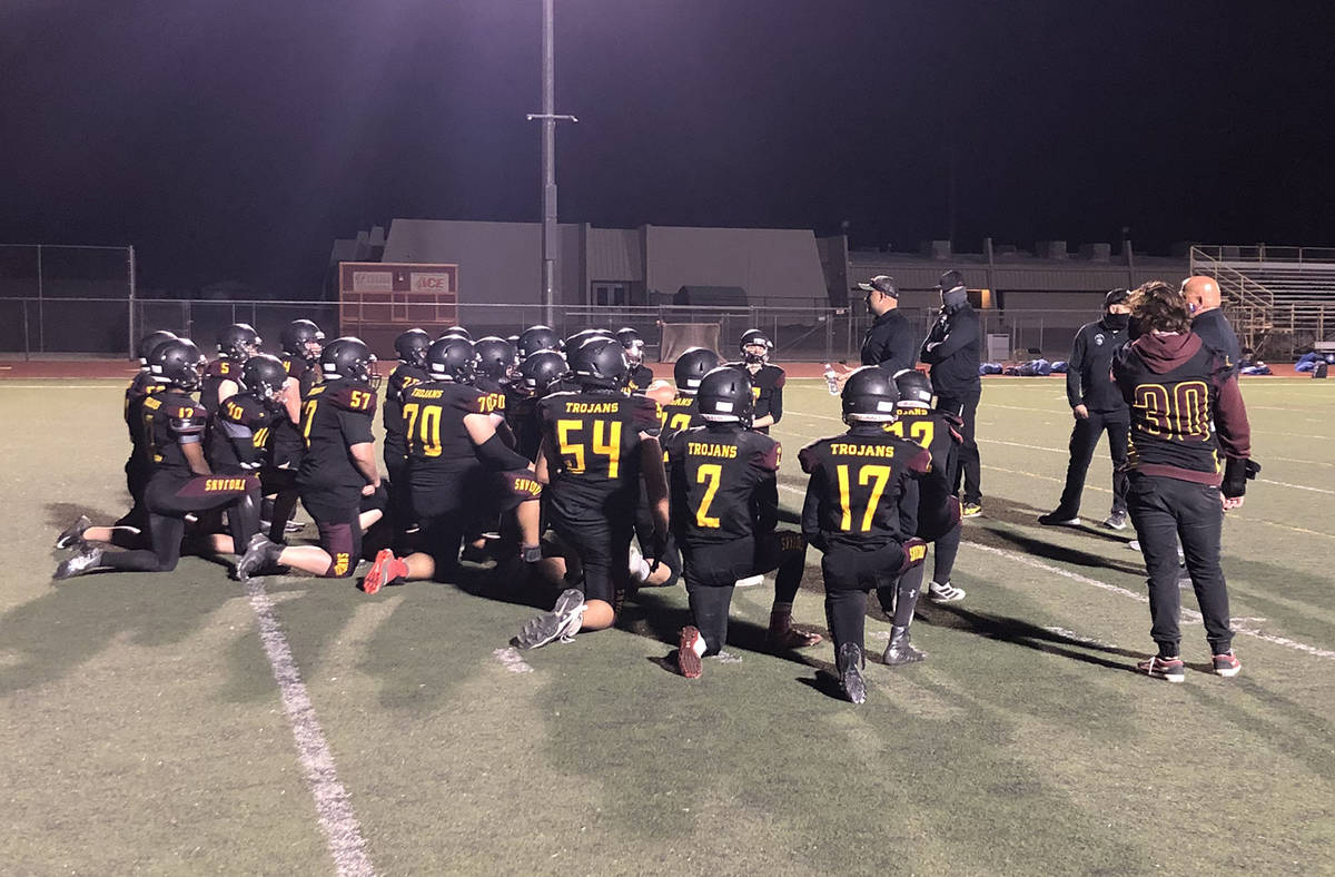 Tom Rysinski/Pahrump Valley Times Pahrump Valley High School football players listen to their c ...