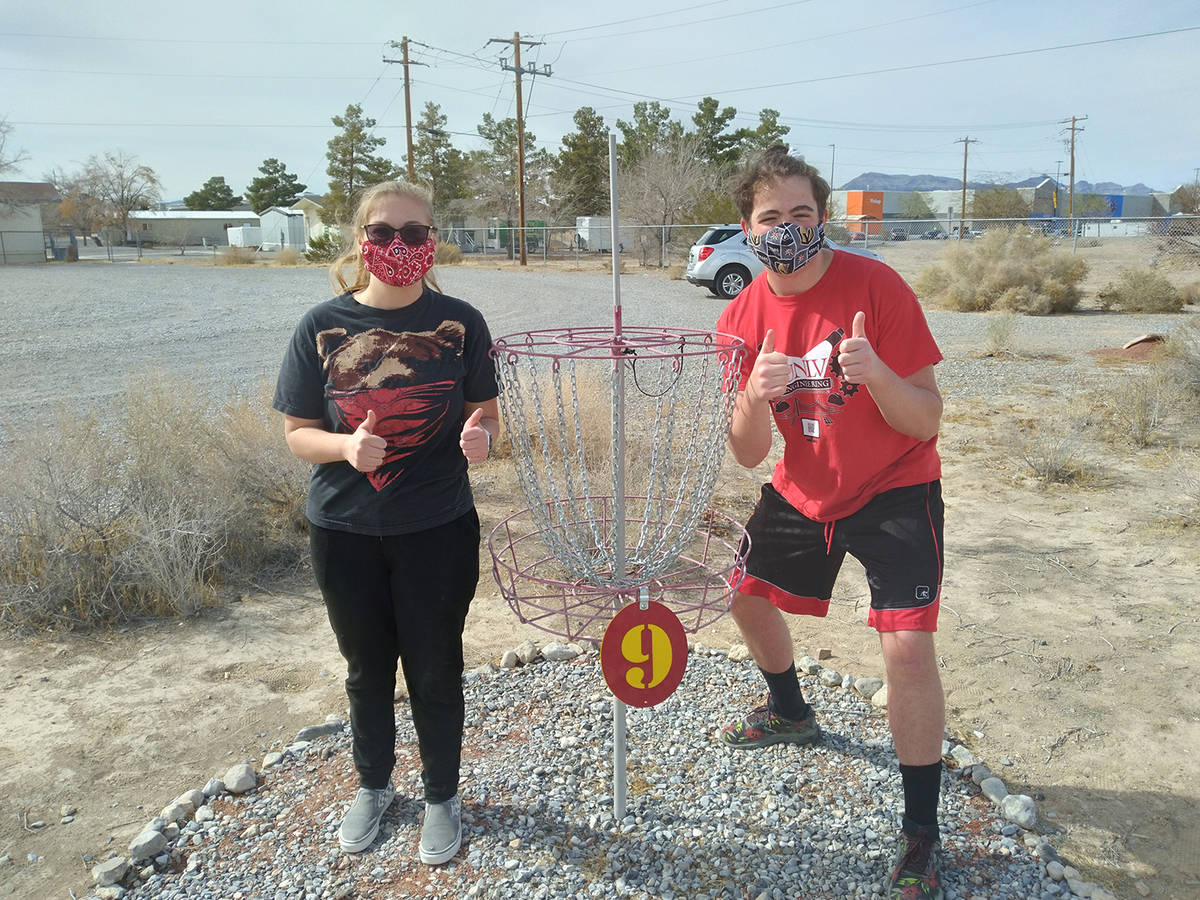 Selwyn Harris/Pahrump Valley Times PVHS Juniors and NHS members Tiffini Thompson and Ted Lieber ...