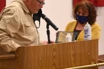 Richard Stephens/Special to the Pahrump Valley Times Randy Reed presents a plaque to Carrie Ra ...