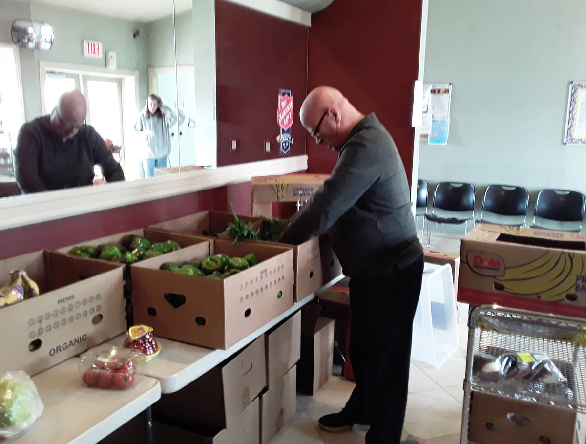 Selwyn Harris/Pahrump Valley Times Pahrump Salvation Army Pastor Jon Watt unloads various food ...
