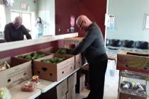 Selwyn Harris/Pahrump Valley Times Pahrump Salvation Army Pastor Jon Watt unloads various food ...