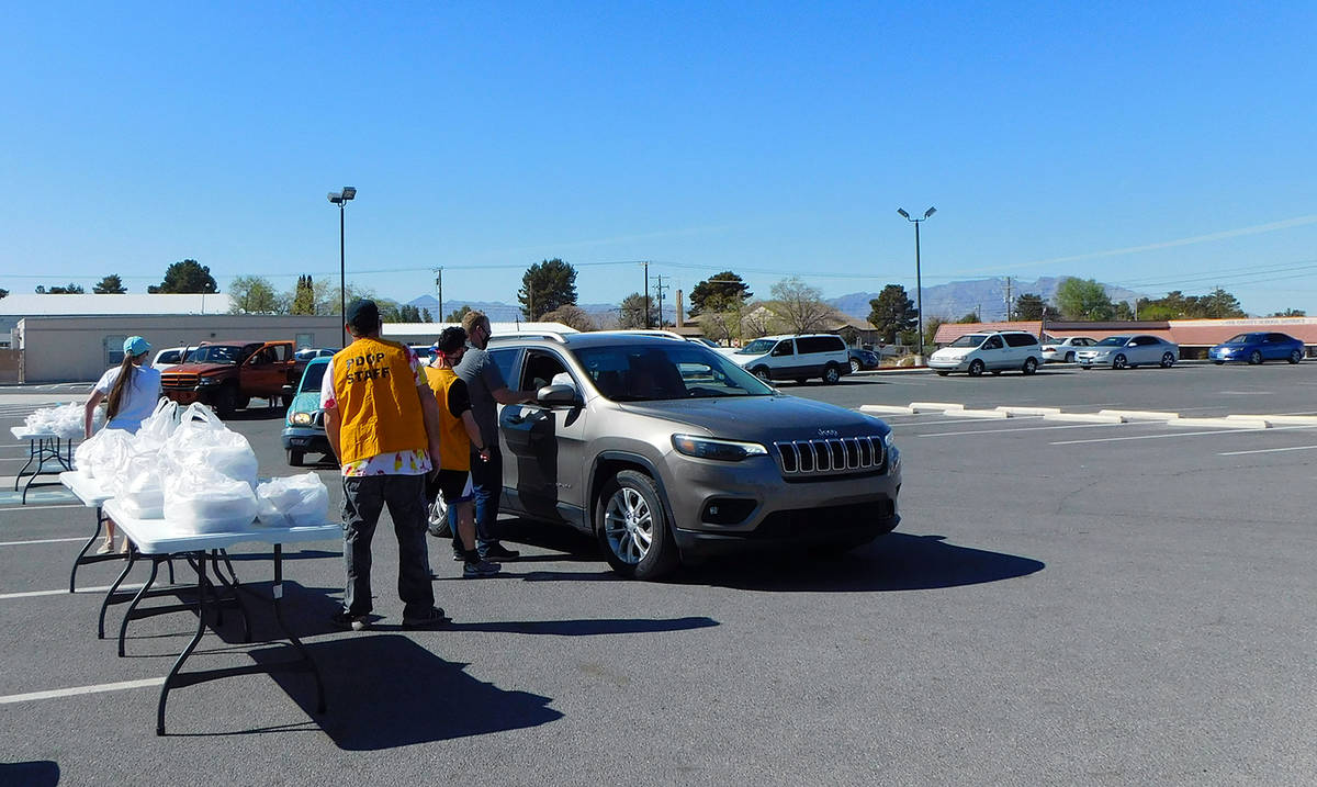 Robin Hebrock/Pahrump Valley Times A line of vehicles can be seen forming in the NyE Communitie ...