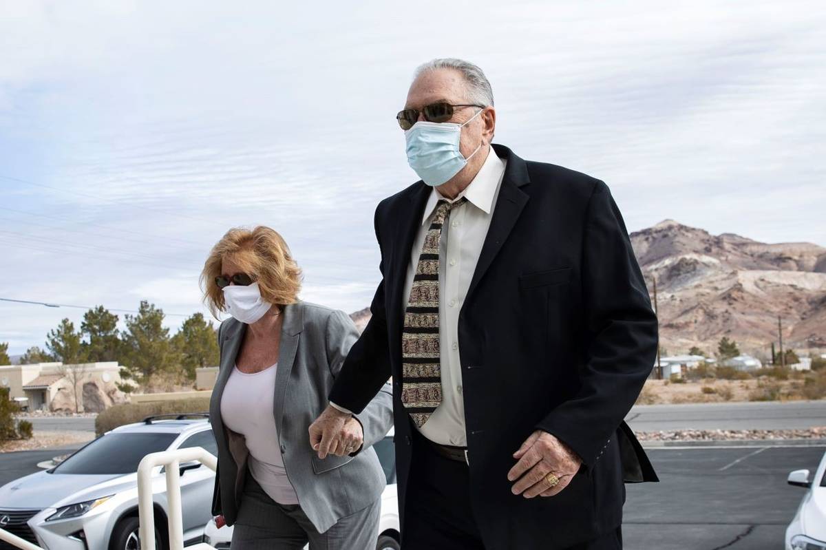 Patricia Chappuis, left, and her husband, Marcel, arrive at Beatty Justice Court on Feb. 1, 202 ...