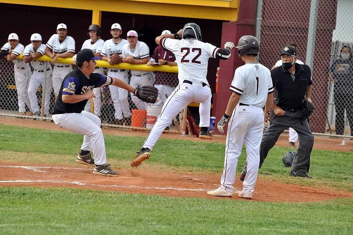 Horace Langford Jr./Pahrump Valley Times Zack Cuellar of Pahrump Valley avoids a tag to score o ...