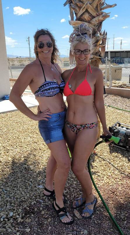 Special to the Pahrump Valley Times Ann Ross and Kelli Sater were ready to take on car-washing ...