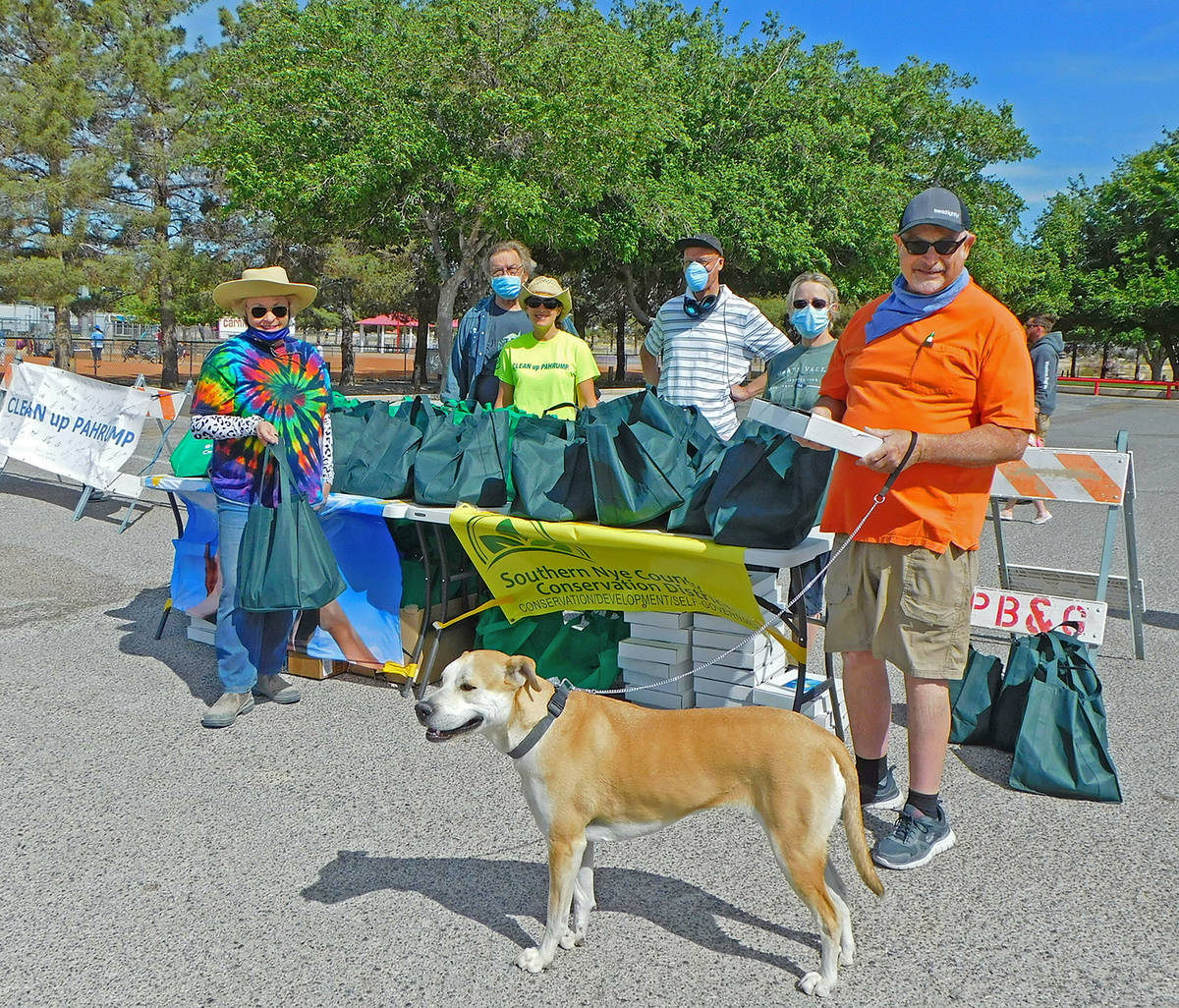 Robin Hebrock/Pahrump Valley Times Earth and Arbor Day Grab-and-Go event volunteers pose for a ...