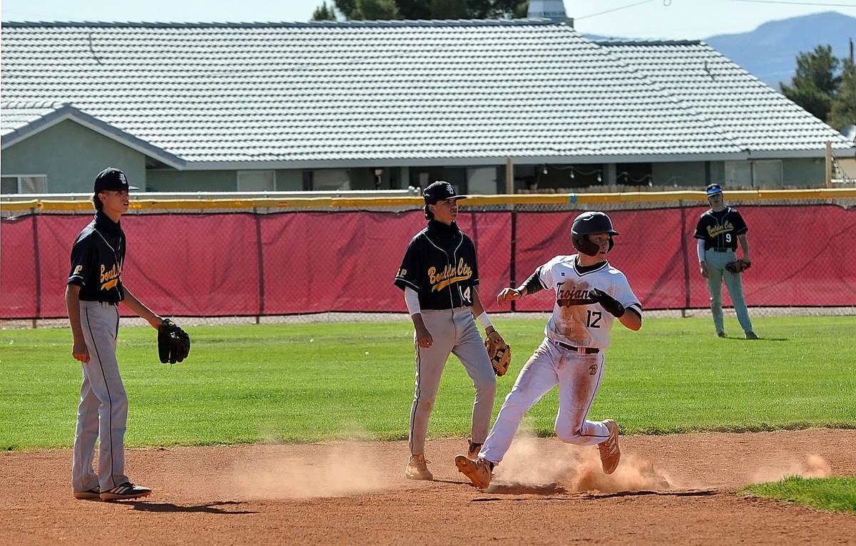 Horace Langford Jr./Pahrump Valley Times Sophomore Kyle McDaniel pulls into second base on a wi ...
