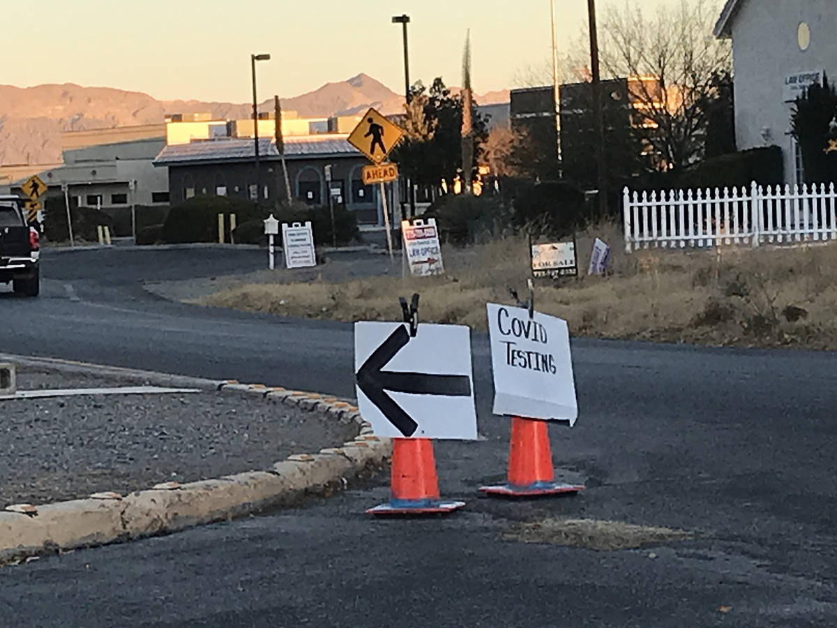 Robin Hebrock/Pahrump Valley Times Signs are placed to help direct traffic as residents arrive ...