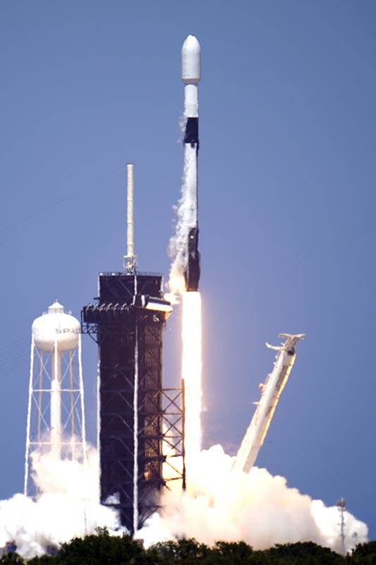 A SpaceX Falcon 9 rocket with the 26th batch of approximately 60 satellites for SpaceX's Starli ...