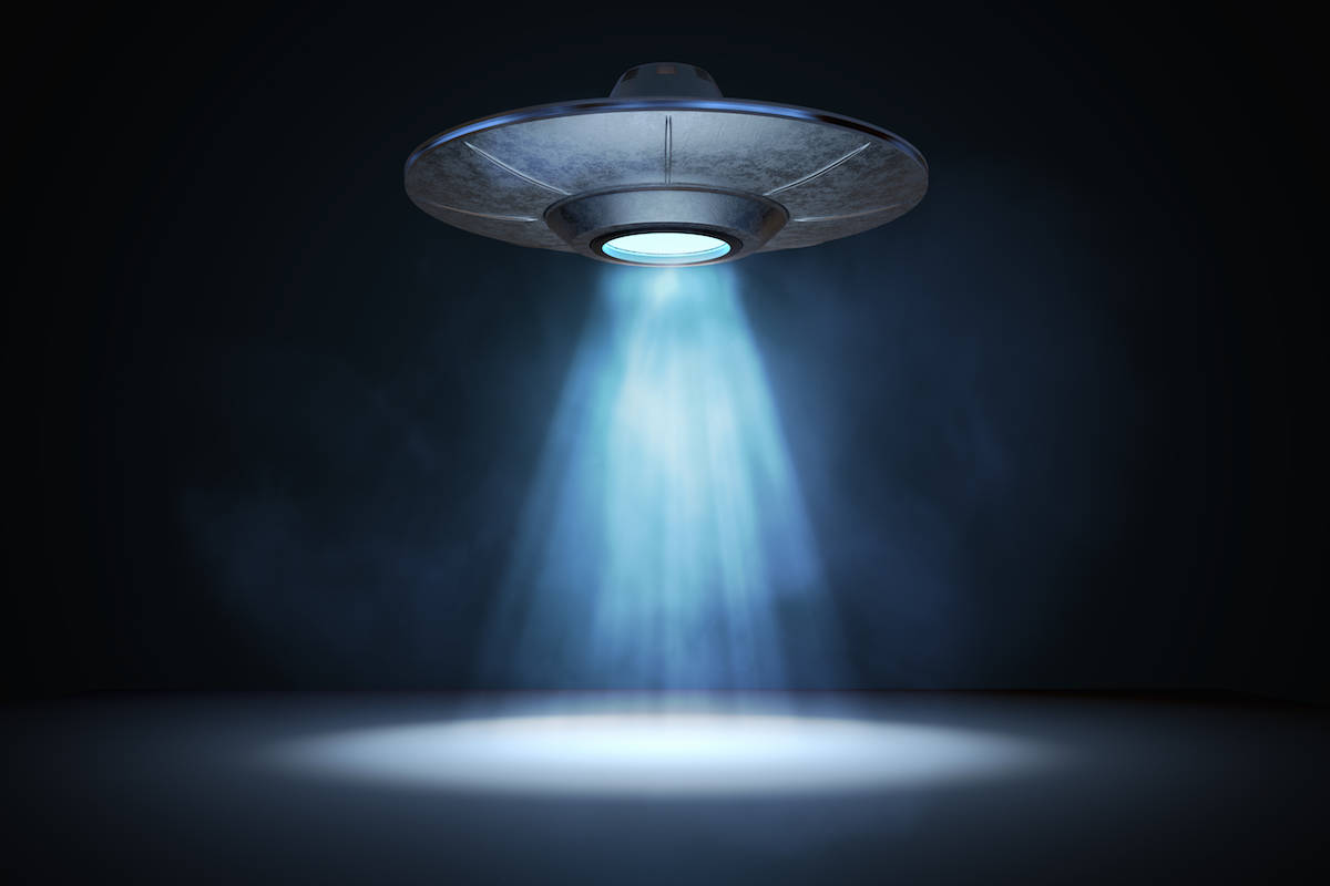 Getty Images A 3D rendered illustration of a light beam from a flying UFO.