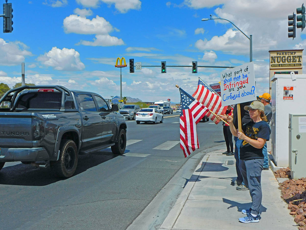 Robin Hebrock/Pahrump Valley Times Cars driving by the intersection of Highways 160 and 372 mad ...