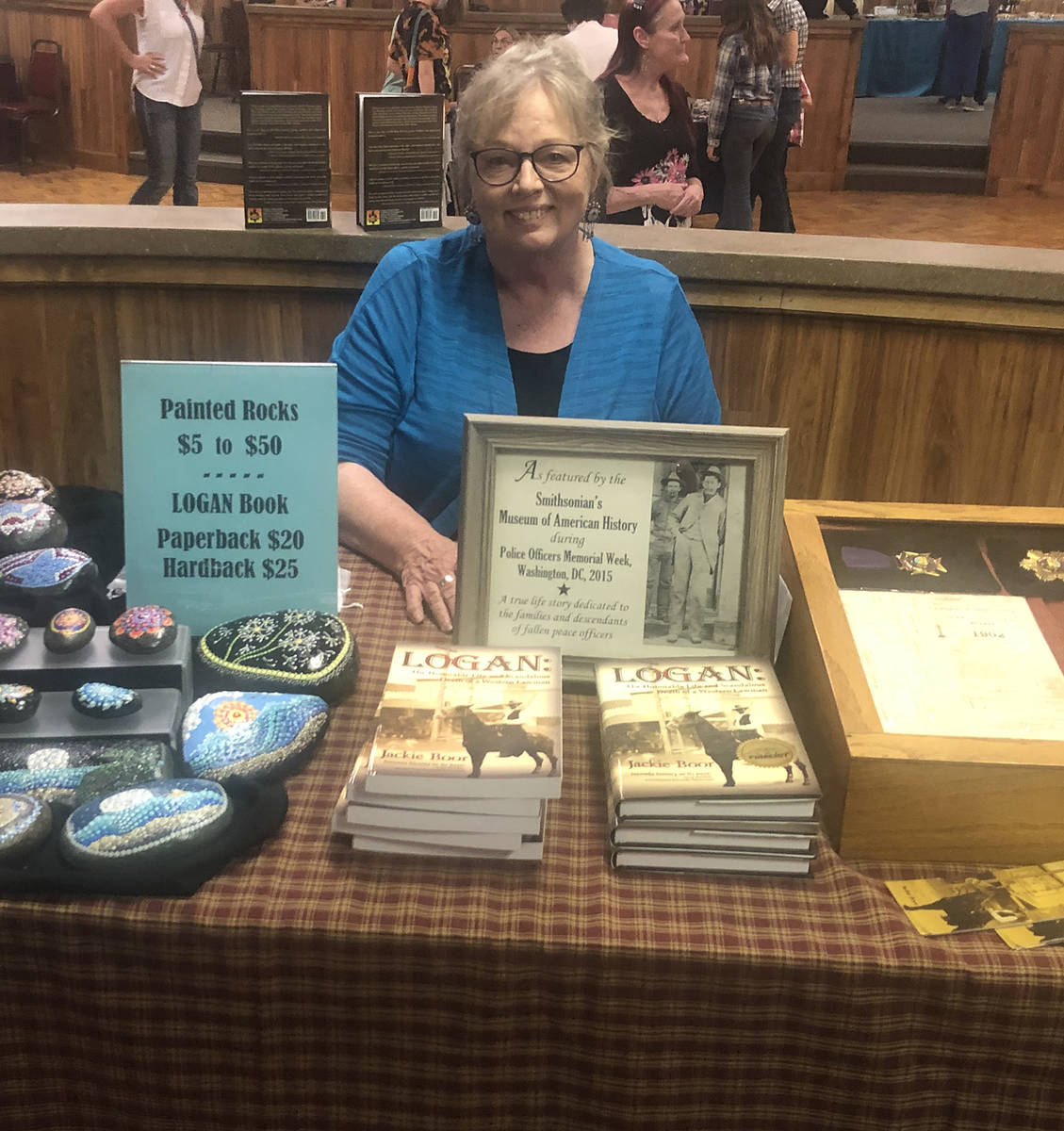 Tom Rysinski/Times-Bonanza & Goldfield News Author Jackie Boor displays copies of her book, his ...