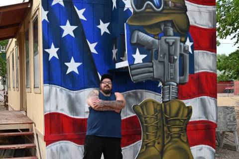 Richard Stephens/Special to the Pahrump Valley Times Artist Polo Parra poses in front of the m ...