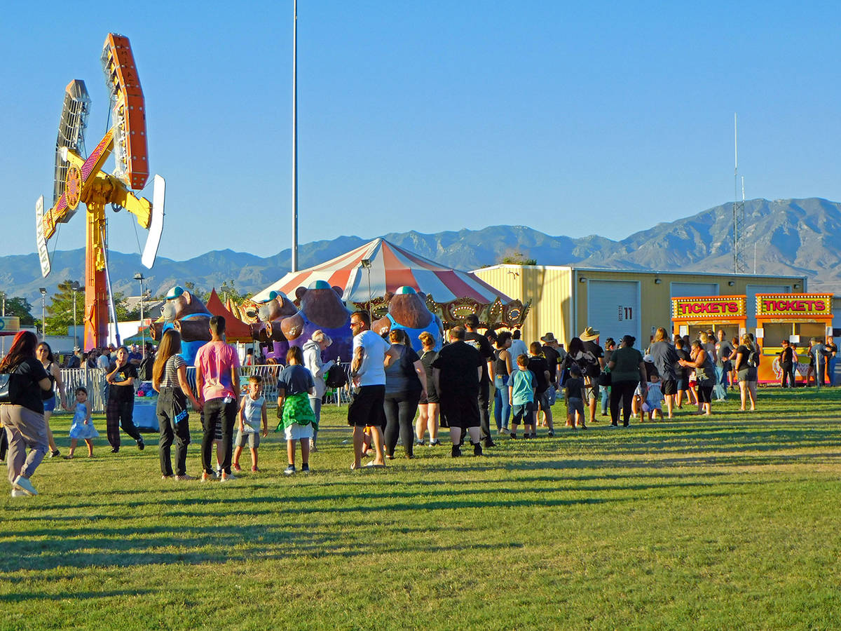 Robin Hebrock/Pahrump Valley Times The carnival at the Pahrump Music Festival was quite busy on ...