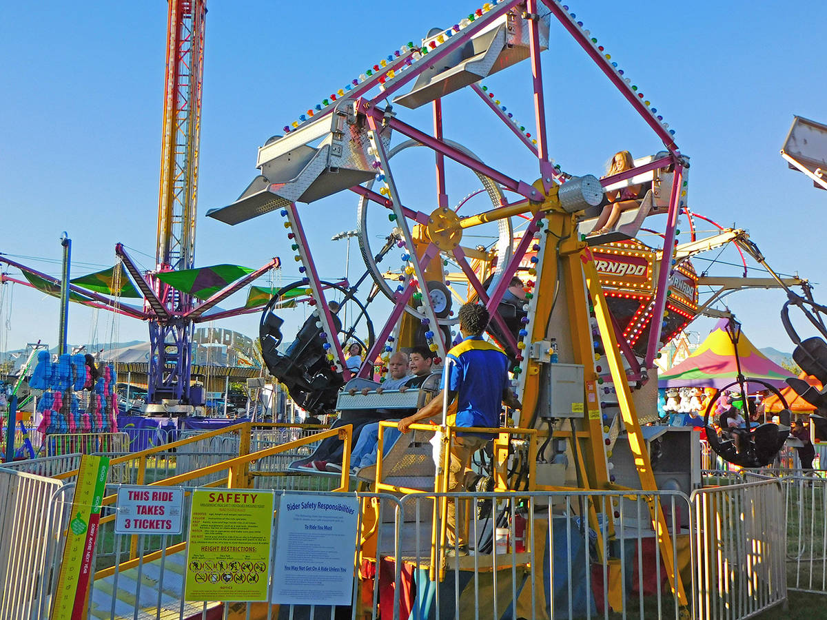 Robin Hebrock/Pahrump Valley Times The Pahrump Music Festival carnival was a big hit, with kidd ...