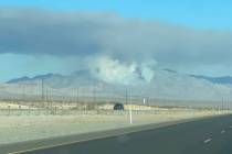 A plume of smoke rises from the Mount Potosi area. (Nye County via Twitter)