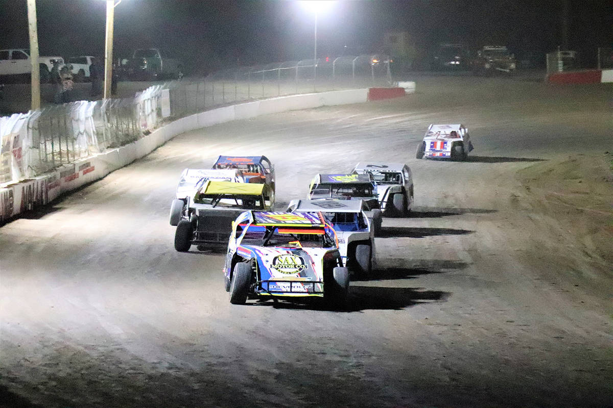File Jared Ward leads at the head of the field during a 2020 race at Pahrump Valley Speedway. W ...