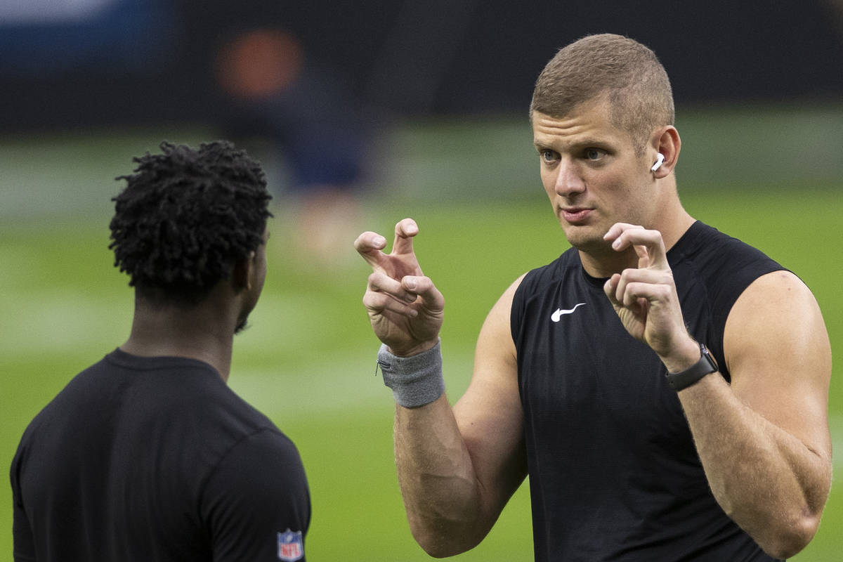 Las Vegas Raiders defensive end Carl Nassib (94) celebrates after