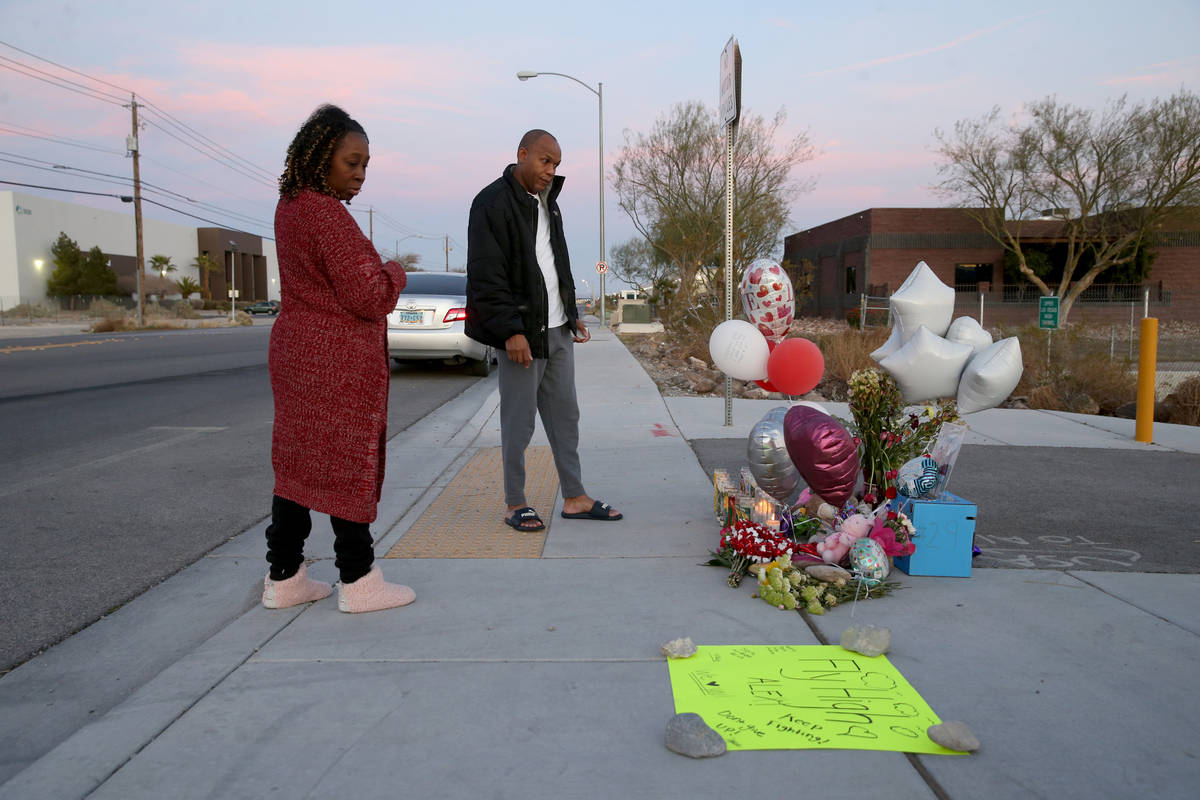 Michelle Johnson and Roy Simms of North Las Vegas pays their respects Monday, Feb. 17, 2020, at ...