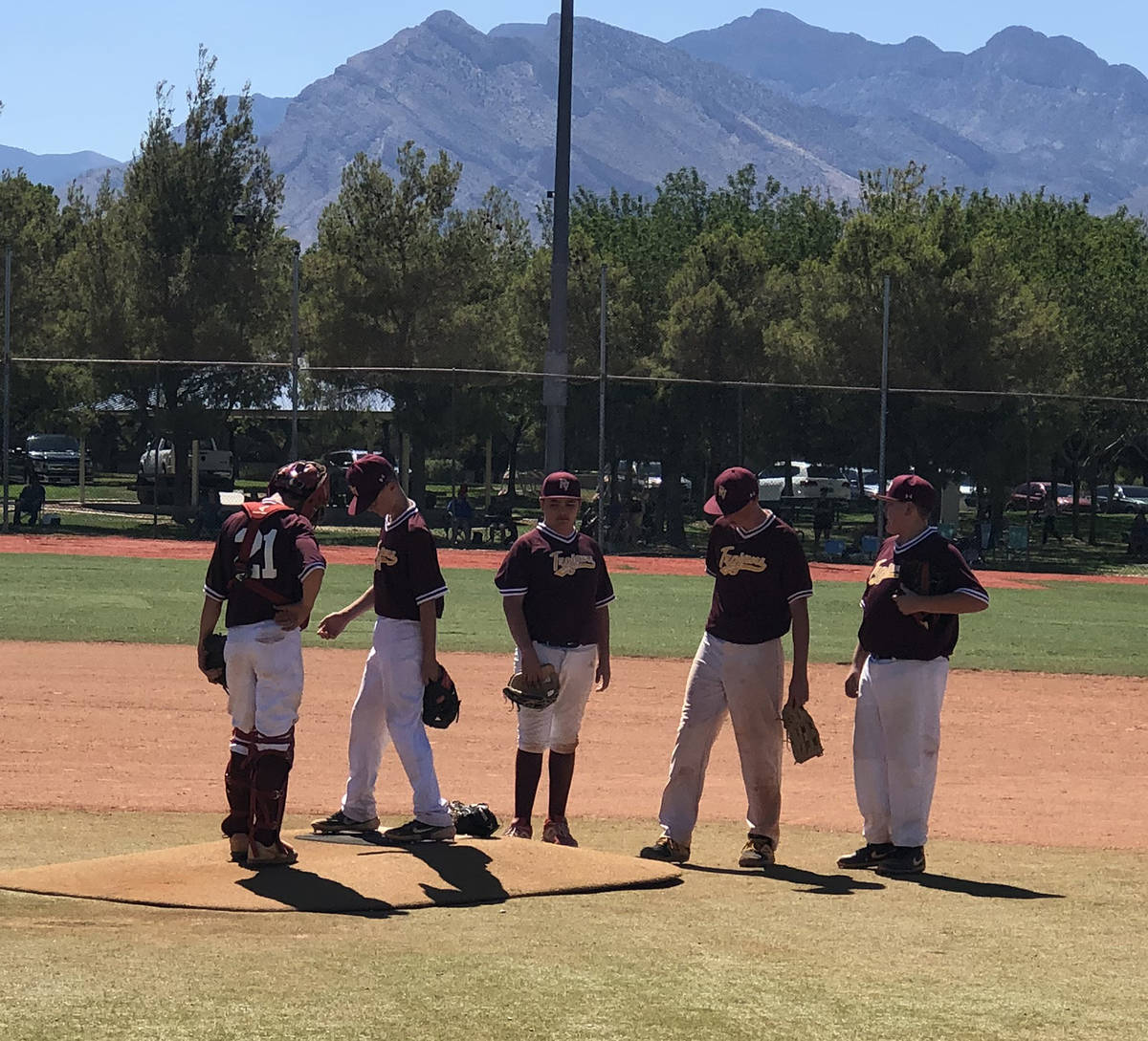 Tom Rysinski/Pahrump Valley Times Pahrump baseball players gather near the mound after a pitchi ...