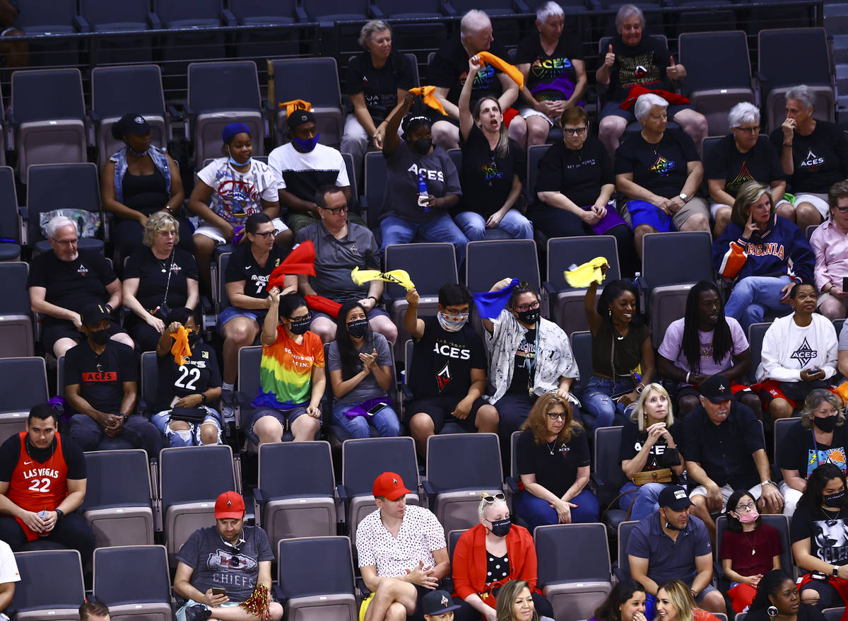 Las Vegas Aces fans cheer during a "Pride Night game" against Seattle Storm in the second quart ...