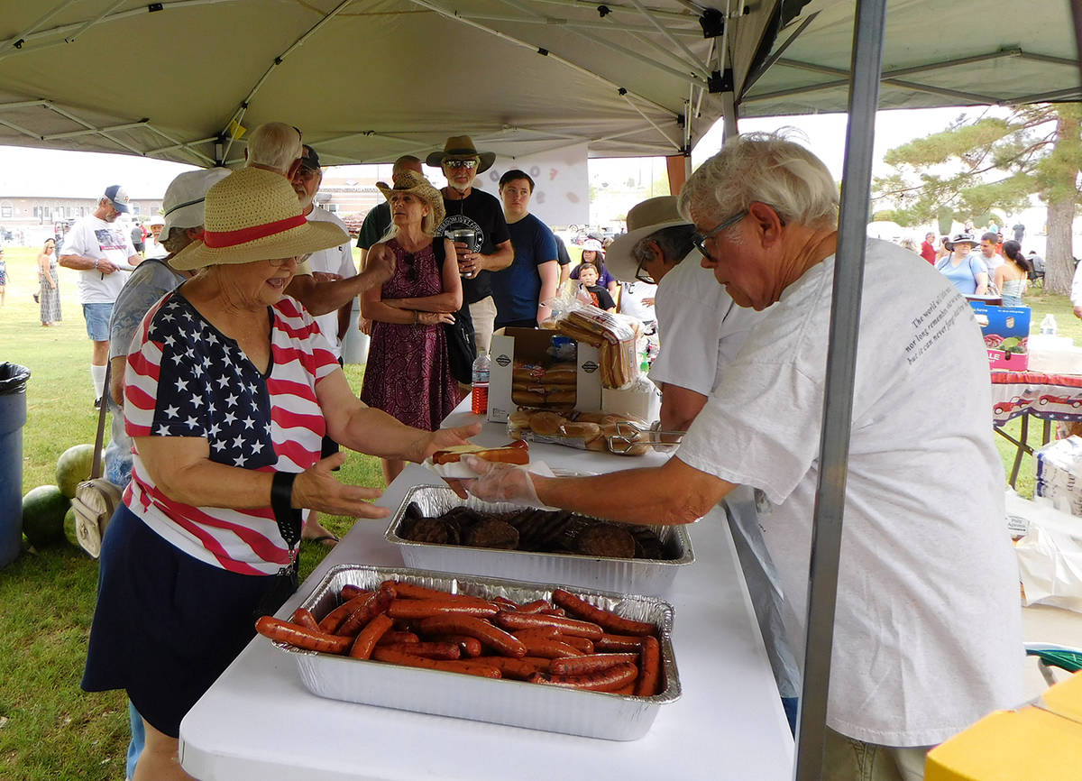 Robin Hebrock/Pahrump Valley Times Around 500 hot dogs and another 500 hamburgers were grilled ...