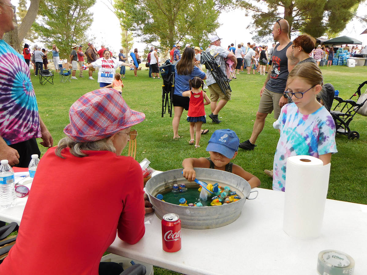 Robin Hebrock/Pahrump Valley Times A youngster plays the duck pond game at the family celebrati ...