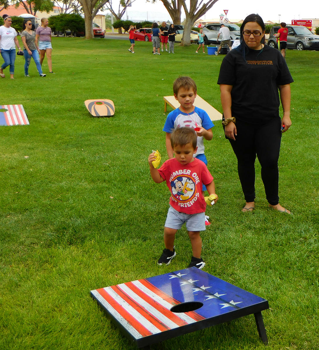 Robin Hebrock/Pahrump Valley Times A young boy is pictured playing corn hole at the July 4 fest ...