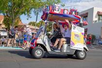 A cart promoting Vax Nevada Days drives through the two-day Damboree event on Saturday, July 3, ...