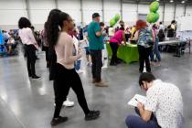People seeking employment attend a summer job fair hosted by Clark County at Las Vegas Conventi ...