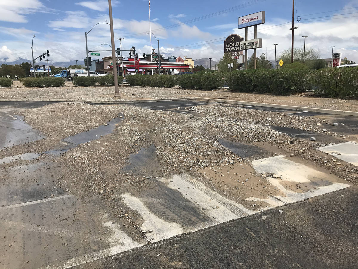 Special to the Pahrump Valley Times The aftermath of flooding resulted in plenty of mud and deb ...