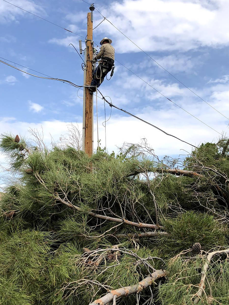 Special to the Pahrump Valley Times Valley Electric offered this photo showing crews addressing ...