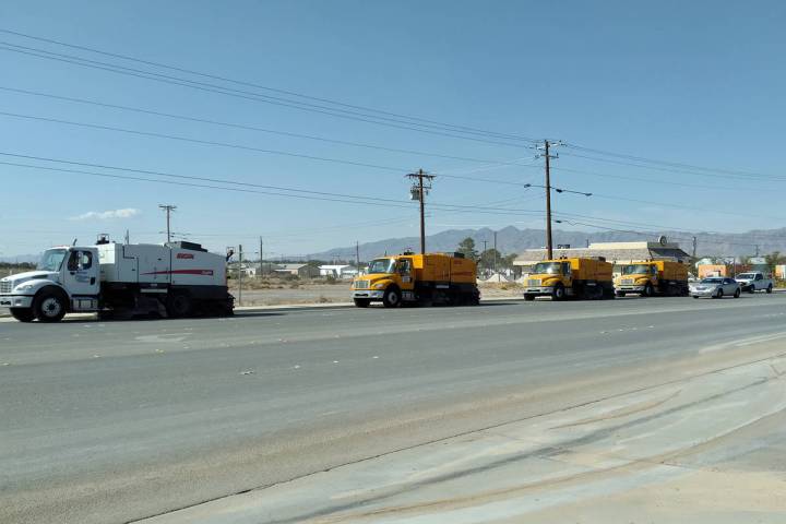 Selwyn Harris/Pahrump Valley Times A veritable convoy of NDOT street cleaners head east on High ...