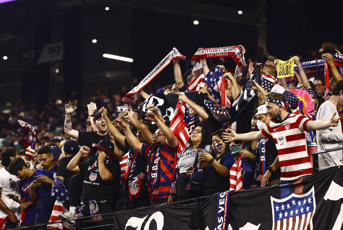 United States fans celebrate after the U.S. defeated Mexico 1-0 in extra time to win the Concac ...