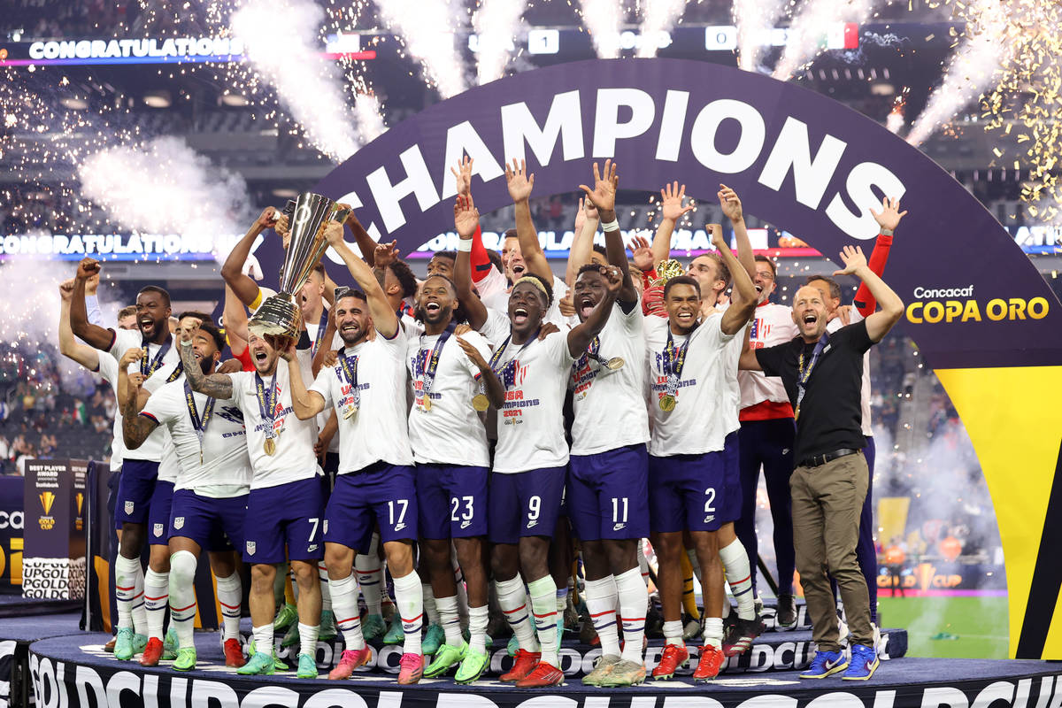 The United States celebrate their victory in the Concacaf Gold Cup final against Mexico at Alle ...