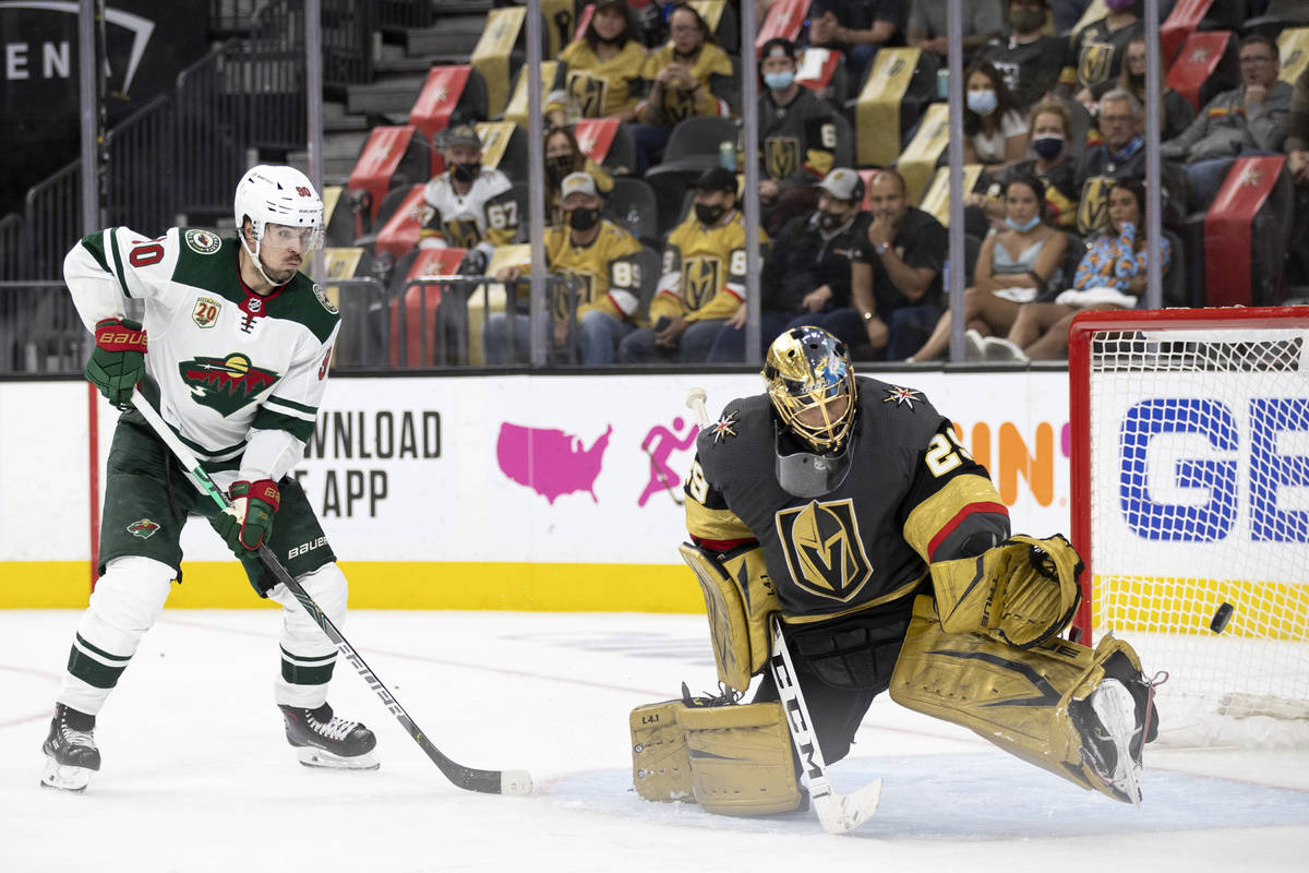 Wild center Marcus Johansson (90) watches to see if the puck goes into the net while Golden Kni ...