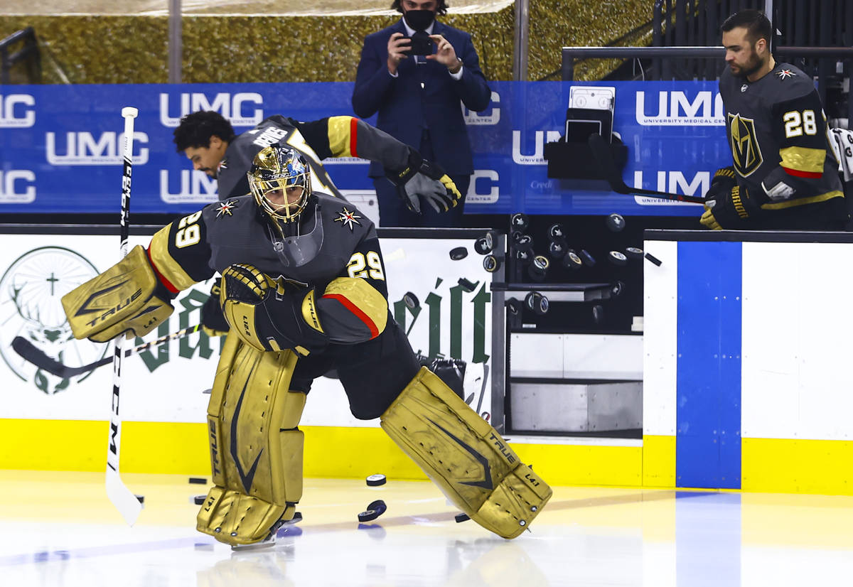 Golden Knights mgoaltender Marc-Andre Fleury warms up before Game 3 of an NHL hockey Stanley Cu ...