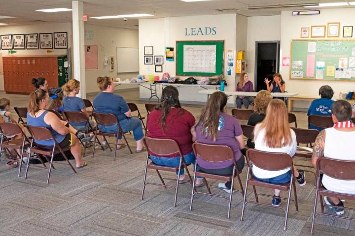 Richard Stephens/Special to the Pahrump Valley Times Grant writer Amanda Hammar (left) and Nye ...