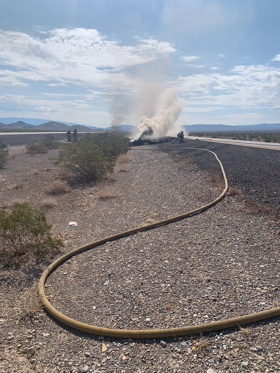 Special to the Pahrump Valley Times Pahrump fire crews responded to a plane crash in the median ...